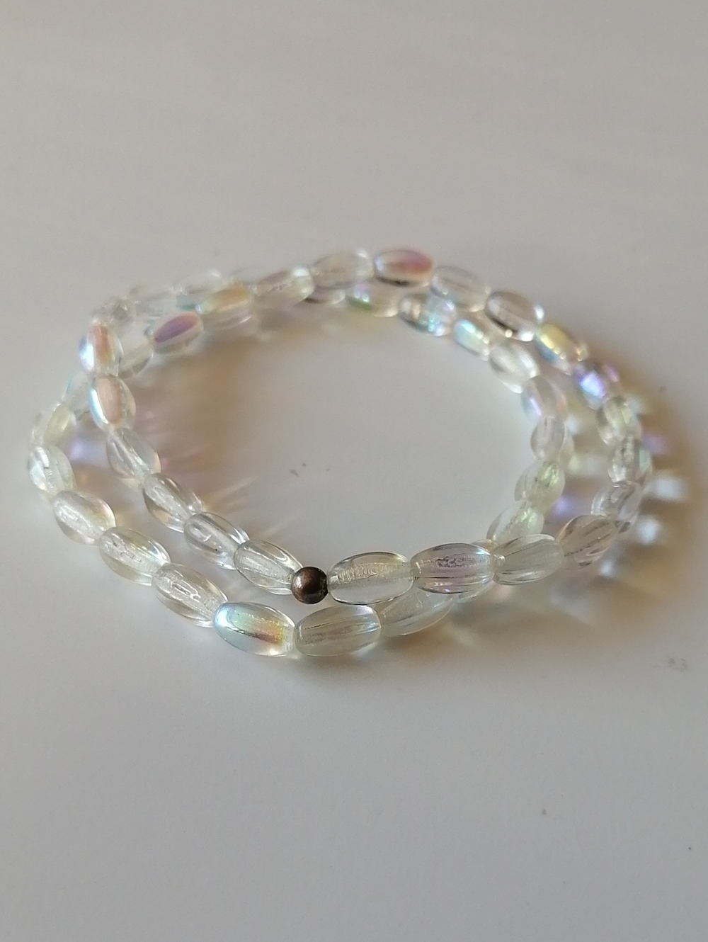 Iridescent Clear Hue Acrylic Beads (46 beads) Bracelet on Plastic Cord